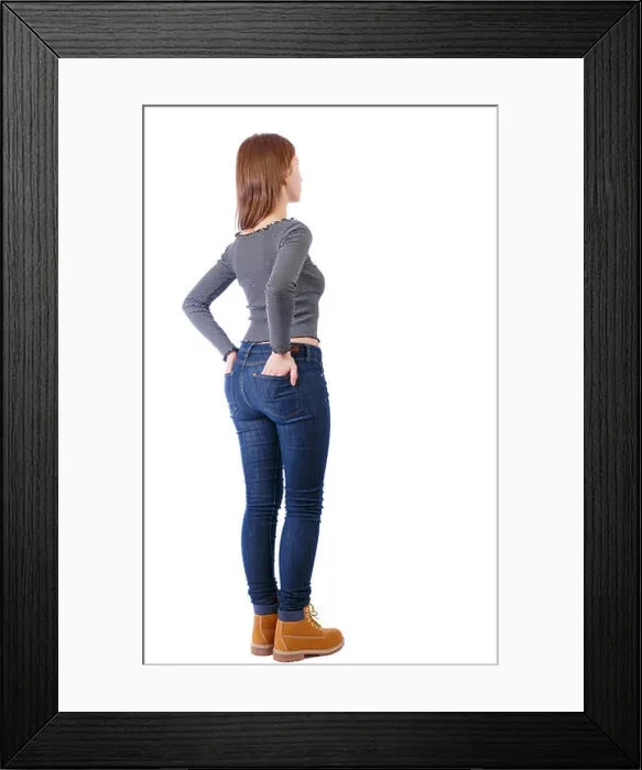 Framed Print : Back view of a woman in jeans. girl watching Framed Print : Back view of a woman in jeans. girl watching