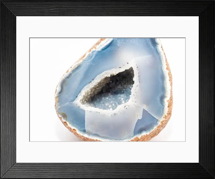 Framed Print : Blue colored geode outside looking like usual rock inside full of small tiny crystals Framed Print : Blue colored geode outside looking like usual rock inside full of small tiny crystals