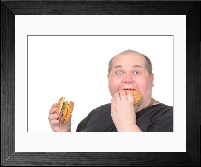 Framed Print : Fat Man Greedily Eating Hamburger, on white background