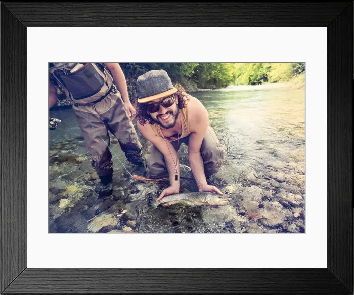 Framed Print : Slovenia, two men fly fishing in Soca river catching a fish Framed Print : Slovenia, two men fly fishing in Soca river catching a fish