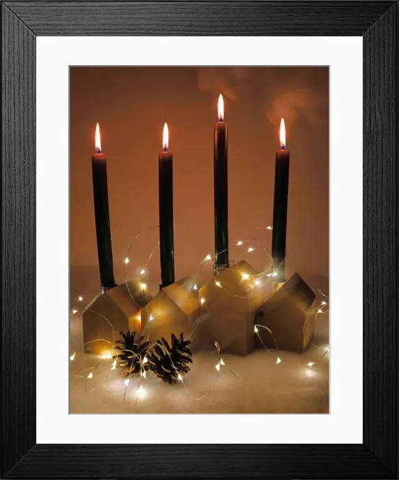 Framed Print : Four decorative candles and little wooden houses for Christmas time Framed Print : Four decorative candles and little wooden houses for Christmas time