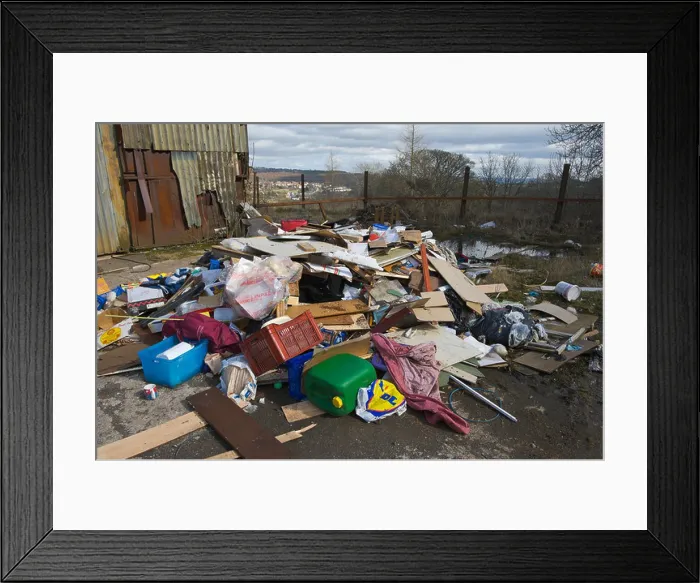 Framed Print : Flytipping of domestic household rubbish at derelict former engineering factory near Talywain Torfaen South Wales UK Framed Print : Flytipping of domestic household rubbish at derelict former engineering factory near Talywain Torfaen South Wales UK
