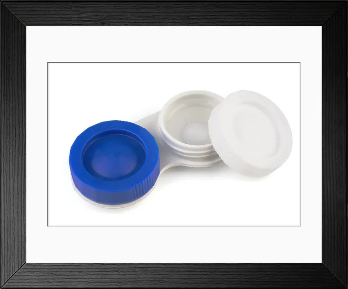 Framed Print : Contact lens in case with solution isolated on white Framed Print : Contact lens in case with solution isolated on white