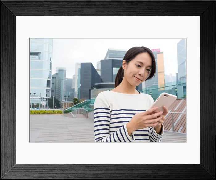 Framed Print : Woman use of smartphone Framed Print : Woman use of smartphone