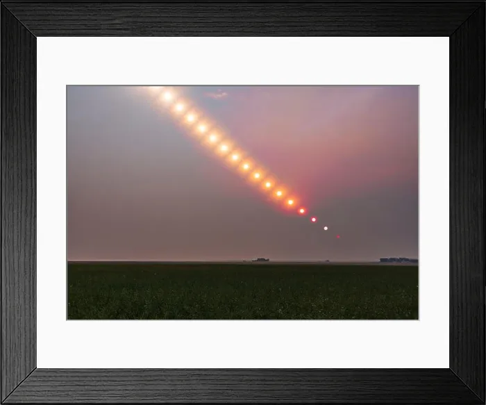 Framed Print : The Sun setting into a pall of forest fire smoke over Alberta, Canada Framed Print : The Sun setting into a pall of forest fire smoke over Alberta, Canada