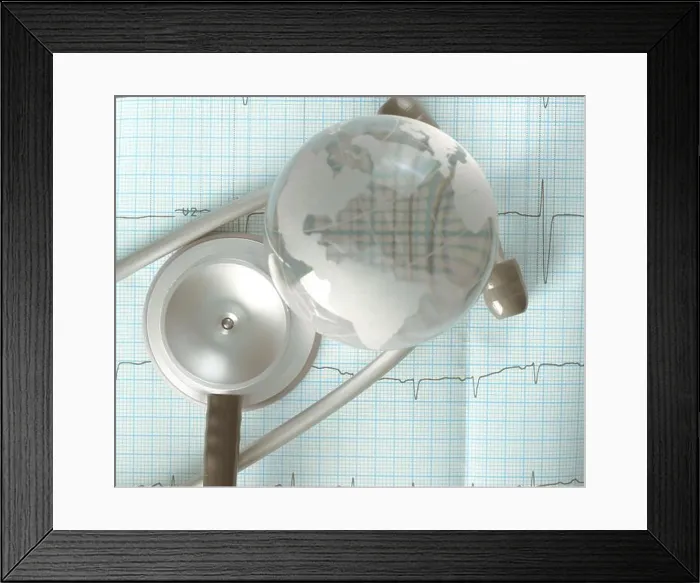 Framed Print : Glass globe and stethoscope over the ECG trace, concept of diagnosis of cardiac diseases Framed Print : Glass globe and stethoscope over the ECG trace, concept of diagnosis of cardiac diseases