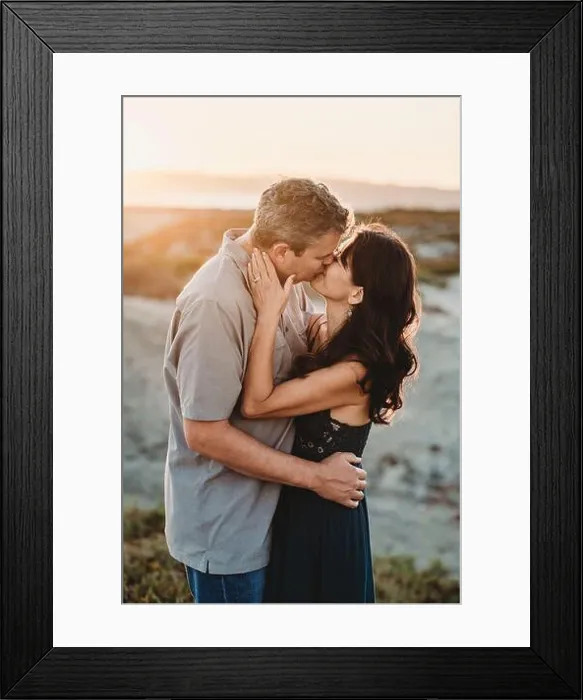 Framed Print : Husband and wife exchange romantic kiss at the Bach Framed Print : Husband and wife exchange romantic kiss at the Bach