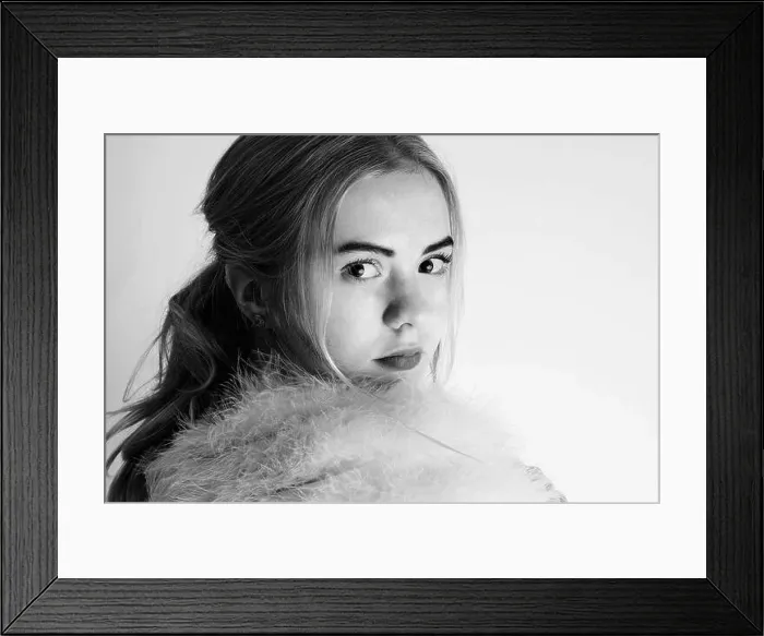 Framed Print : Newyork lash style image of a young adult with light in her eyes. Makes you think of the 20's Framed Print : Newyork lash style image of a young adult with light in her eyes. Makes you think of the 20's