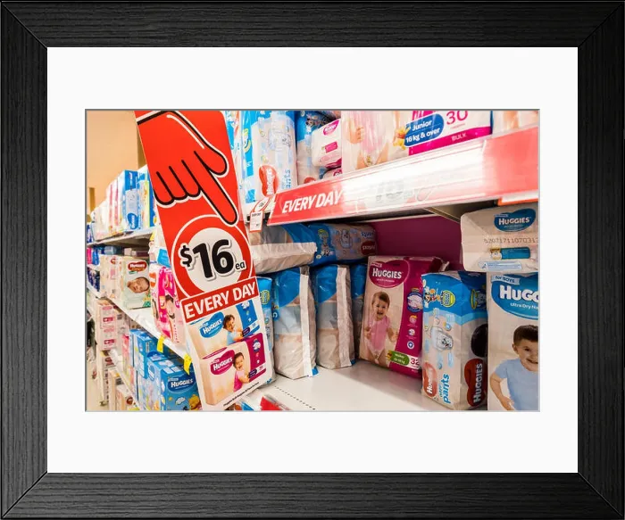 Framed Print : Huggies nappies for babies and small children on sale at a Coles supermarket in Sydney, Australia Framed Print : Huggies nappies for babies and small children on sale at a Coles supermarket in Sydney, Australia