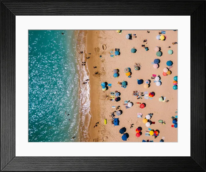 Framed Print : Aerial View From Flying Drone Of People Crowd Relaxing On Algarve Beach In Portugal Framed Print : Aerial View From Flying Drone Of People Crowd Relaxing On Algarve Beach In Portugal