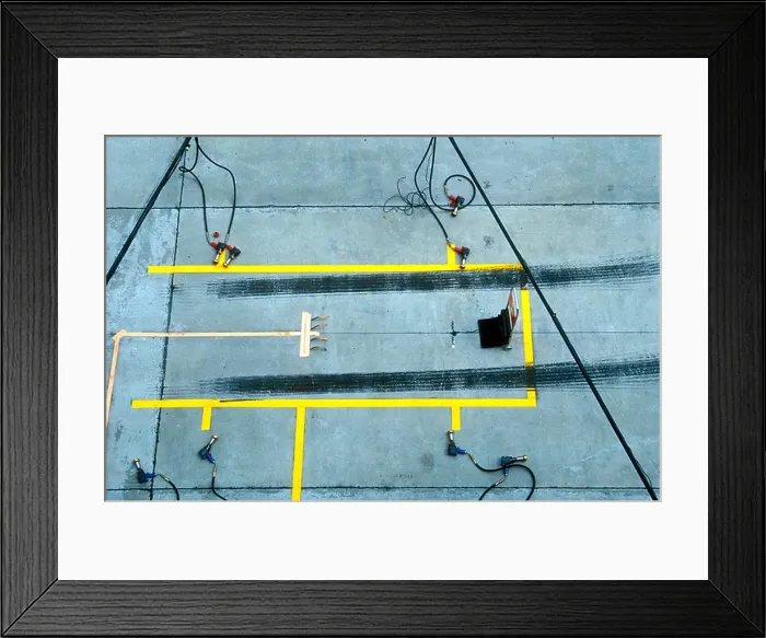 Framed Print : A formula one pit box with skid marks Framed Print : A formula one pit box with skid marks