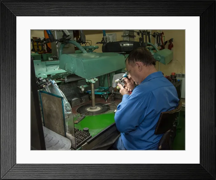 Framed Print : Polisher is looking at diamond. Yakutian Dimond cutting. Barnaul Altai krai Russia Siberia Asia Framed Print : Polisher is looking at diamond. Yakutian Dimond cutting. Barnaul Altai krai Russia Siberia Asia