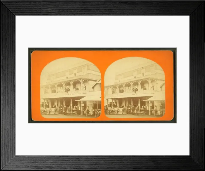 Framed Print : People gathered in front of and on the balcony of a large building