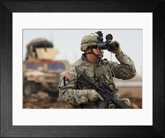 Framed Print : U.S. Army Pfc. Jason Dore looks for any possible enemy contact in western Baghdad Framed Print : U.S. Army Pfc. Jason Dore looks for any possible enemy contact in western Baghdad