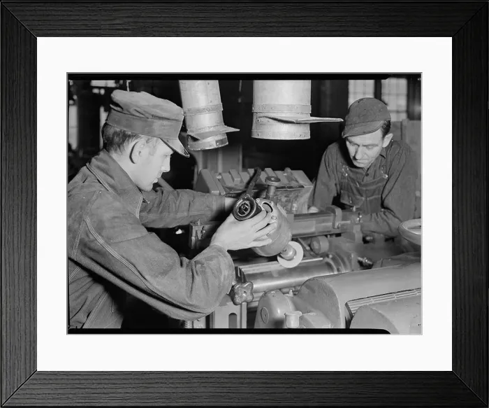 Framed Print : A 1936 photograph by Lewis Hine showing a worker grinding knives at a factory in High Point Framed Print : A 1936 photograph by Lewis Hine showing a worker grinding knives at a factory in High Point