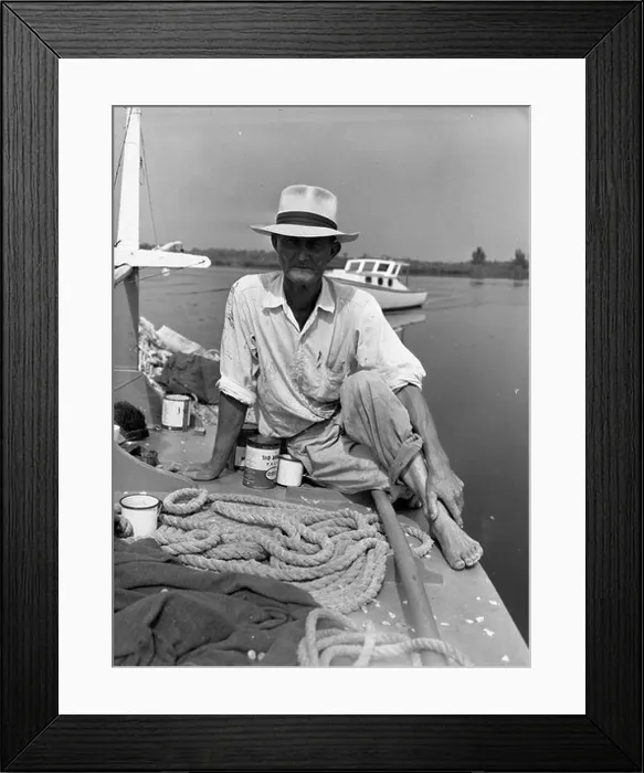 Framed Print : Elisha Pappy Turner is seen fishing with a seine net in Naples Framed Print : Elisha Pappy Turner is seen fishing with a seine net in Naples