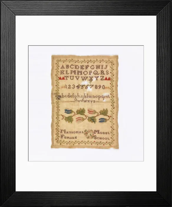 Framed Print : Sampler. Alphabets, numerals, floral cross border and text Framed Print : Sampler. Alphabets, numerals, floral cross border and text