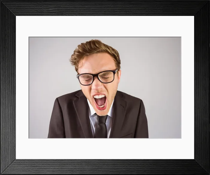 Framed Print : Young angry businessman shouting at camera Framed Print : Young angry businessman shouting at camera