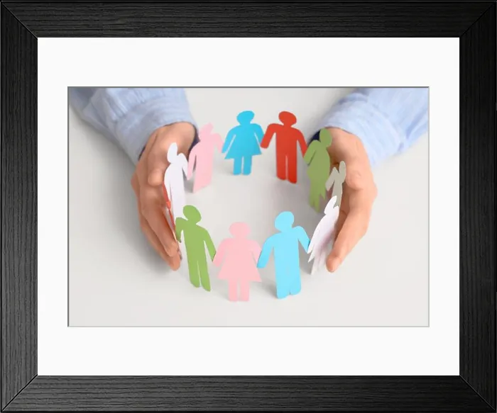 Framed Print : Female hands with colorful paper human figures on light background, closeup. Diversity and inclusion concept Framed Print : Female hands with colorful paper human figures on light background, closeup. Diversity and inclusion concept