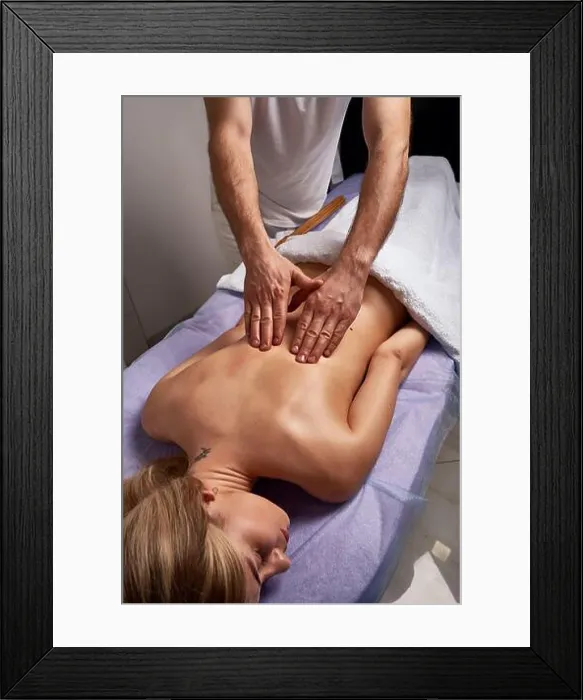 Framed Print : Male masseur doing massage on beautiful naked woman body in the spa salon. Beauty treatment concept. Framed Print : Male masseur doing massage on beautiful naked woman body in the spa salon. Beauty treatment concept.