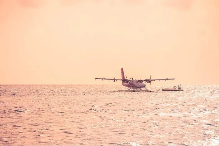 Framed Print : 05.06.2019 - Ari Atoll, Maldives: Exotic scene with seaplane on Maldives sea landing. Vacation holiday in Maldives concept background. Seaplane taxi