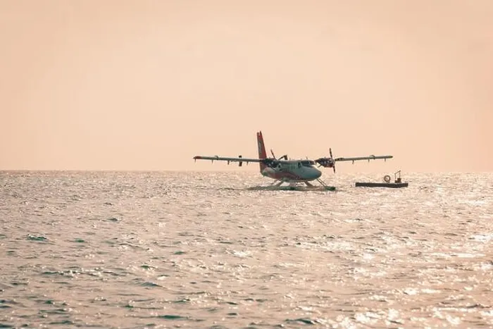 Framed Print : 05.06.2019 - Ari Atoll, Maldives: Exotic scene with seaplane on Maldives sea landing. Vacation holiday in Maldives concept background. Seaplane taxi Framed Print : 05.06.2019 - Ari Atoll, Maldives: Exotic scene with seaplane on Maldives sea landing. Vacation holiday in Maldives concept background. Seaplane taxi