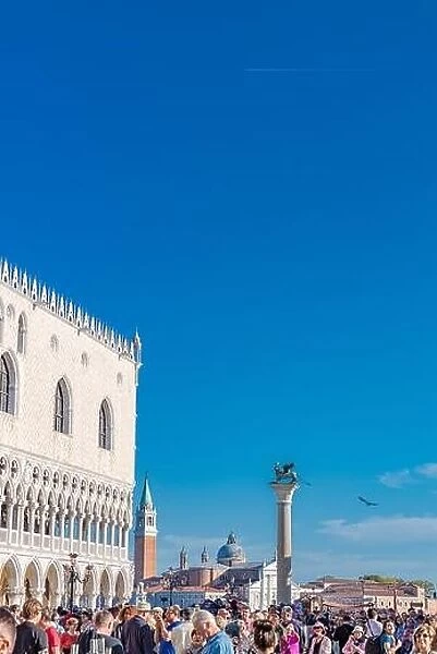 09.20.19: The St. Mark's Square with Campanile and Doge's Palace. Venice, Italy. Artistic architecture with blue sky