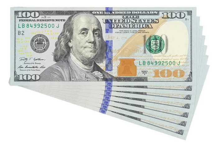 Framed Print : 100 dollar bills on white background isolated. Business money concept template Framed Print : 100 dollar bills on white background isolated. Business money concept template