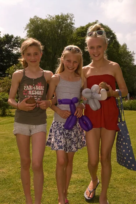 Framed Print : Three 11 year old girls having fun at a summer fete, East Meon, Hampshire, UK Framed Print : Three 11 year old girls having fun at a summer fete, East Meon, Hampshire, UK