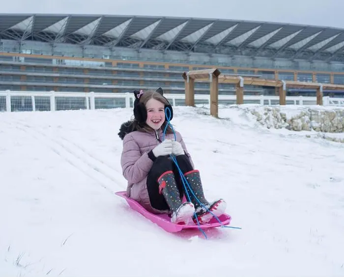 Framed Print : 18th March 2018: Ascot, UK - Daisy Spiers, 10, sledging at Ascot Racecourse Credit: Andrew Spiers / Alamy Live News Framed Print : 18th March 2018: Ascot, UK - Daisy Spiers, 10, sledging at Ascot Racecourse Credit: Andrew Spiers / Alamy Live News