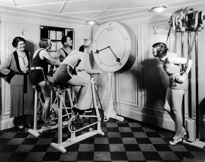 Framed Print : 1920s GROUP 4 WOMEN ONE MAN IN EXERCISE GYM LOOKING AT CLOCK Framed Print : 1920s GROUP 4 WOMEN ONE MAN IN EXERCISE GYM LOOKING AT CLOCK