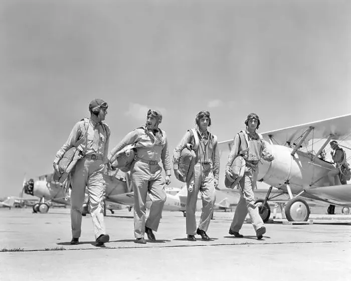 Framed Print : 1940S FOUR U.S. NAVY PILOTS WALKING TOGETHER ON TARMAC RETURNING FROM AIR MANEUVERS AT THE PHILADELPHIA NAVY YARD PA Framed Print : 1940S FOUR U.S. NAVY PILOTS WALKING TOGETHER ON TARMAC RETURNING FROM AIR MANEUVERS AT THE PHILADELPHIA NAVY YARD PA