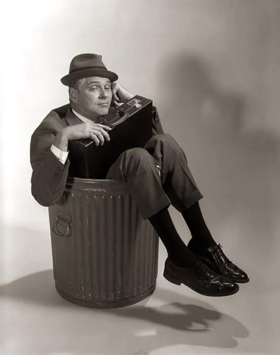 Framed Print : 1960s SYMBOLIC BUSINESSMAN IN SUIT & HAT HOLDING BRIEFCASE DUMPED FIRED MADE REDUNDANT LAID OFF UNEMPLOYED SITTING IN Framed Print : 1960s SYMBOLIC BUSINESSMAN IN SUIT & HAT HOLDING BRIEFCASE DUMPED FIRED MADE REDUNDANT LAID OFF UNEMPLOYED SITTING IN