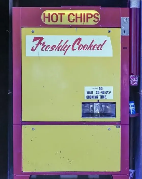 Framed Print : A 1981 historic image of a Hot Chip vending machine in Christchurch on the south island of New Zealand