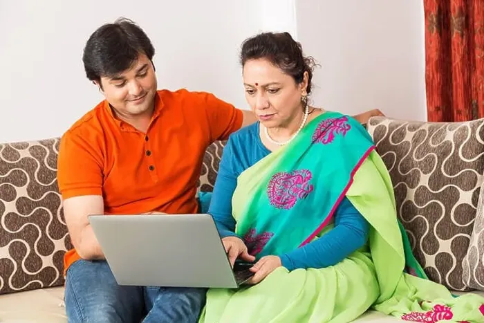 Framed Print : 2 Indian Adult Son And Senior Mother Using Laptop At Home