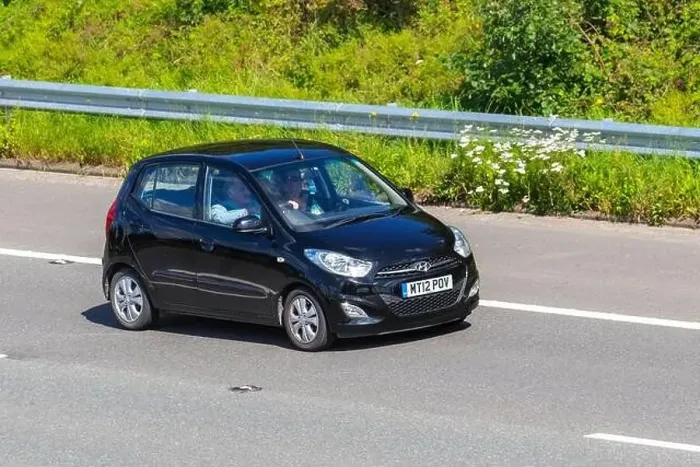 Framed Print : 2012 black Hyundai I10 Active; Vehicular traffic moving vehicles Framed Print : 2012 black Hyundai I10 Active; Vehicular traffic moving vehicles