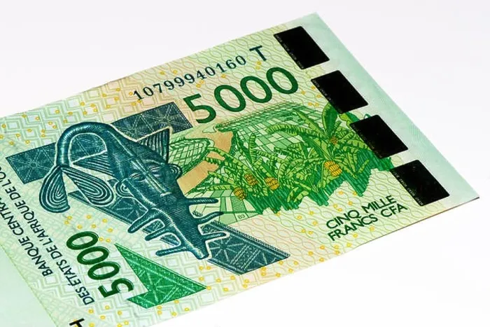 Framed Print : 5000 CFA franc bank note. CFA franc is used in 14 African countries Framed Print : 5000 CFA franc bank note. CFA franc is used in 14 African countries