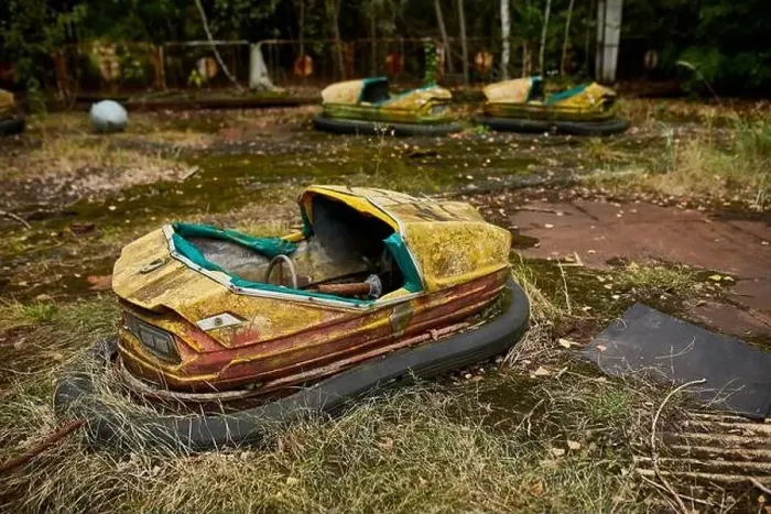 Framed Print : Abandoned bumper cars in the amusement park in ghost town of Pripyat city in Chernobyl Exclusion Zone, Ukraine