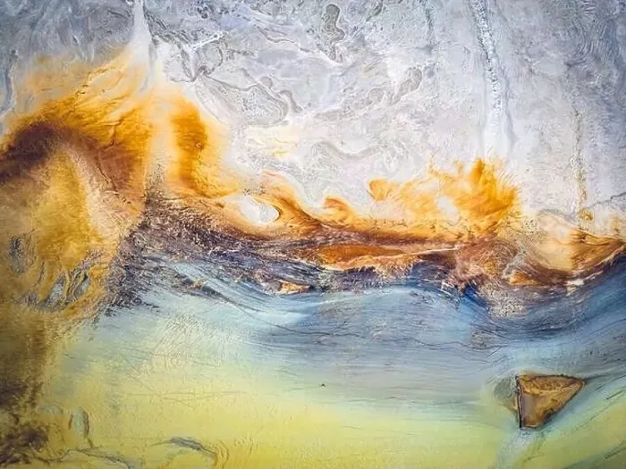 Framed Print : Abstract patterns formed in the shape of a dragon head of toxic waste from mining operations Framed Print : Abstract patterns formed in the shape of a dragon head of toxic waste from mining operations