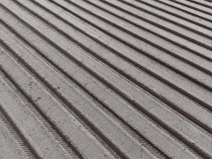 Framed Print : Abstract view from a drone showing the recently ploughed arable field, set into parallel lines Framed Print : Abstract view from a drone showing the recently ploughed arable field, set into parallel lines