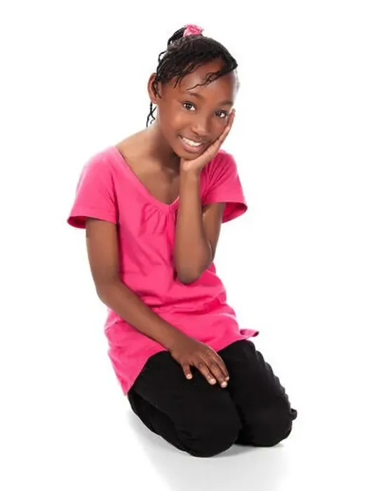 Framed Print : Adorable small african child with braids wearing a bright green shirt and black skinny jeans Framed Print : Adorable small african child with braids wearing a bright green shirt and black skinny jeans