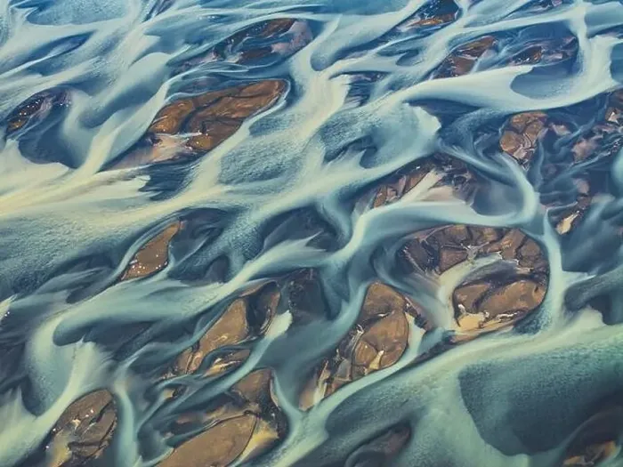 Framed Print : Aerial abstract view taken by drone of the textured river along the Icelandic southern coast, Iceland, Polar Regions Framed Print : Aerial abstract view taken by drone of the textured river along the Icelandic southern coast, Iceland, Polar Regions