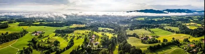 Framed Print : Aerial Bad Toelz Bavarian Alps. Golf Course. Blomberg Mountain. Morning Drone Shot with some clouds in the sky