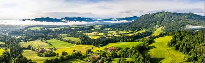 Framed Print : Aerial Bad Toelz Bavarian Alps. Golf Course. Blomberg Mountain. Morning Drone Shot with some clouds in the sky