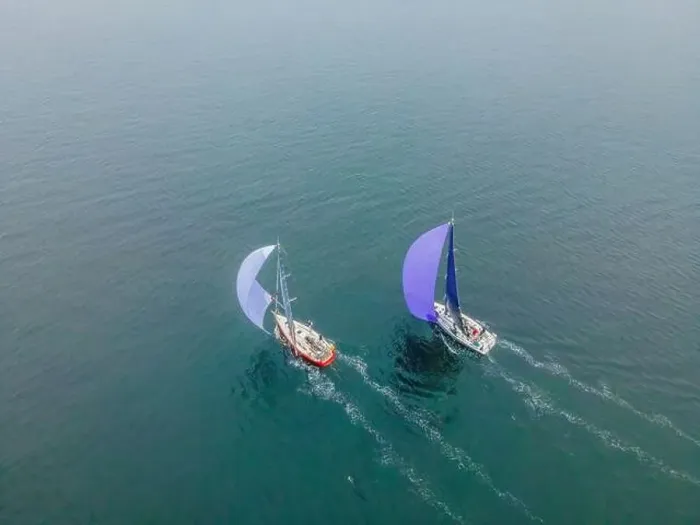 Framed Print : Aerial bird's eye view photo taken by drone of sailboat in turquoise sea water