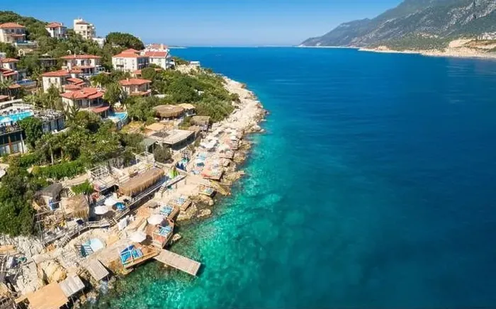 Framed Print : Aerial coastal view of villas, day beds, and swimming platforms on the Kaş peninsula, Kaş, Antalya, Turkey Framed Print : Aerial coastal view of villas, day beds, and swimming platforms on the Kaş peninsula, Kaş, Antalya, Turkey