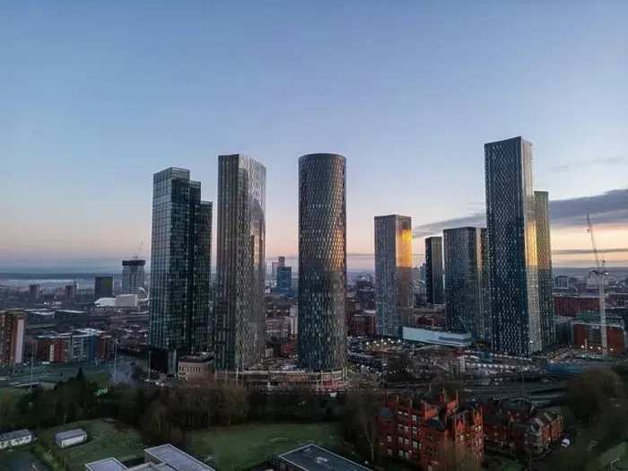 Framed Print : Aerial of Deansgate Square Manchester UK in the blue zone just before sunrise.Deansgate Square South Tower Framed Print : Aerial of Deansgate Square Manchester UK in the blue zone just before sunrise.Deansgate Square South Tower