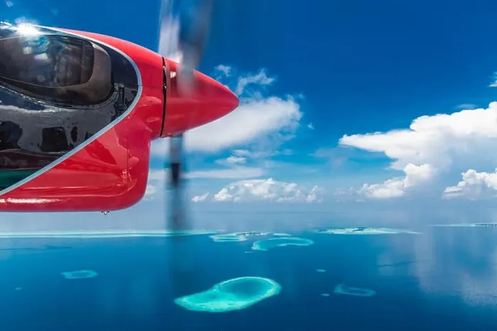 Framed Print : Aerial drone bird's eye view photo of Maldives island and sea. Beautiful turquoise and sapphire clear water beach. Exotic vacation from seaplane view Framed Print : Aerial drone bird's eye view photo of Maldives island and sea. Beautiful turquoise and sapphire clear water beach. Exotic vacation from seaplane view