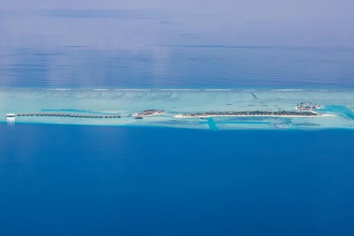 Framed Print : Aerial drone bird's eye view photo of Maldives island and sea. Beautiful turquoise and sapphire clear water beach. Exotic vacation from seaplane view Framed Print : Aerial drone bird's eye view photo of Maldives island and sea. Beautiful turquoise and sapphire clear water beach. Exotic vacation from seaplane view