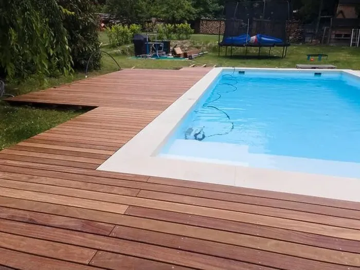 Framed Print : aerial drone flight over beautiful green garden with pool and the wooden deck of the pool is in progress Framed Print : aerial drone flight over beautiful green garden with pool and the wooden deck of the pool is in progress